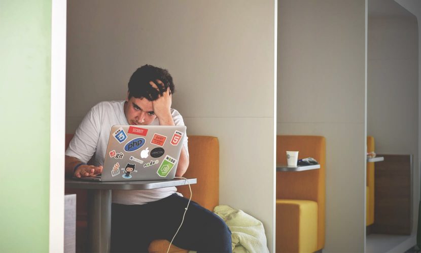 man using laptop